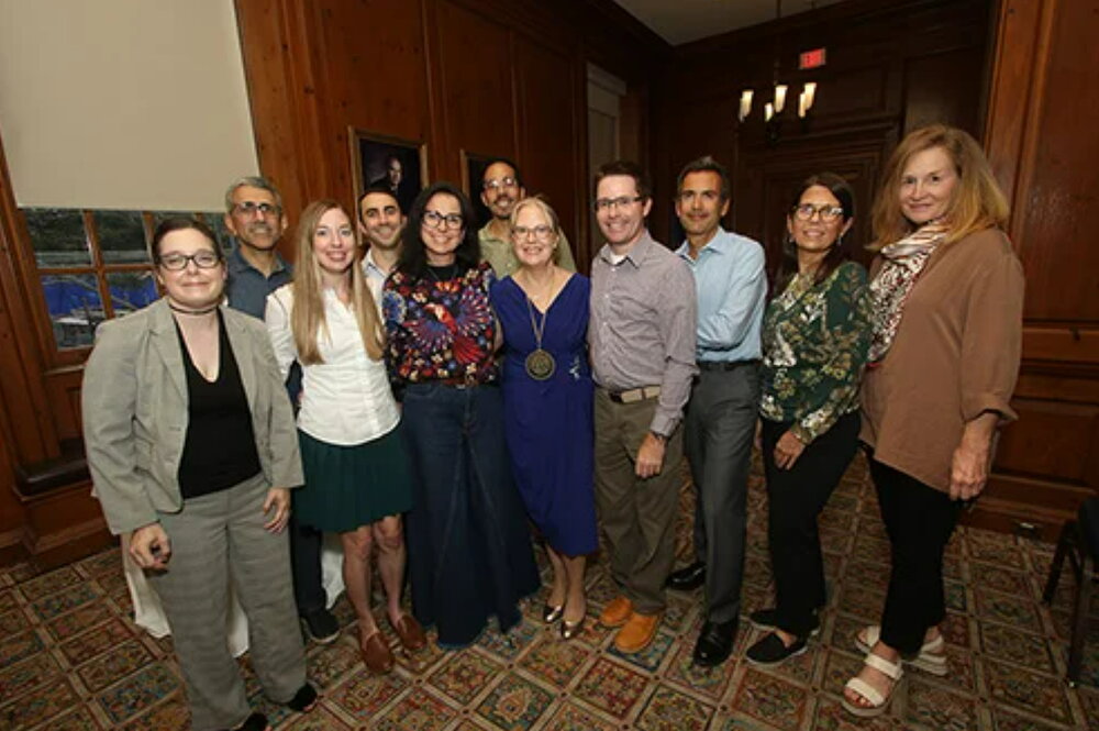 Many attended the investiture of Silvina Montrul (center, blue) as the Marjorie Roberts Professor in Liberal Arts & Sciences. (Photo by Carlton Bruett)